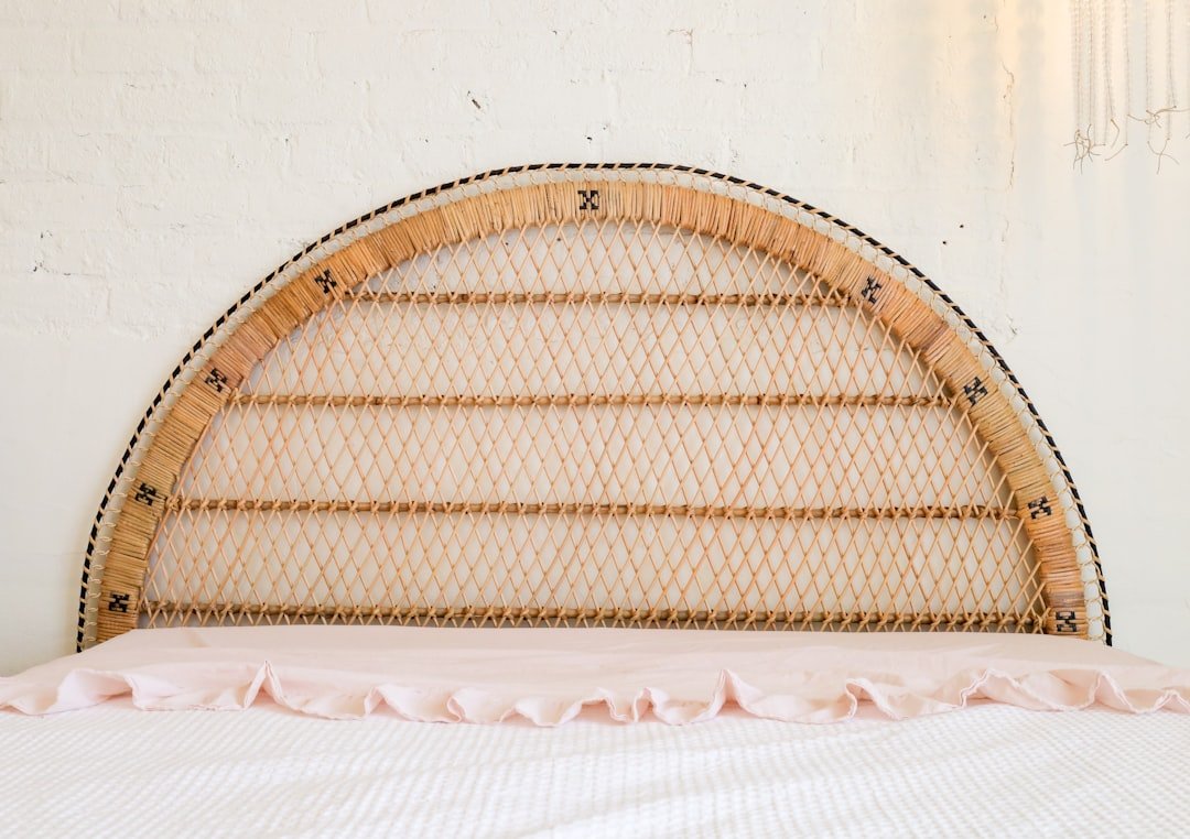 Cross-section diagram showing layered Arctic sleeping system with ground insulation, sleeping bag, and emergency bivy