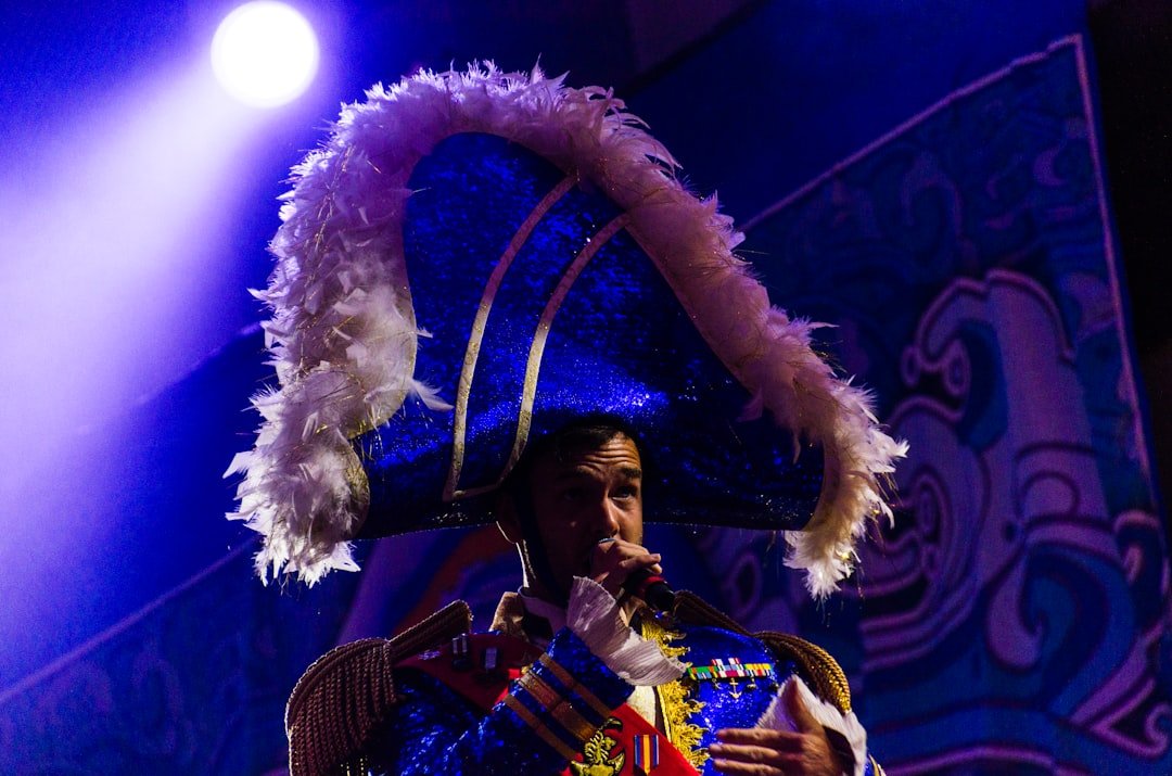 Contemporary Sami musician performing traditional joik with modern instrumentation on stage